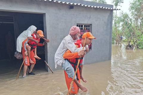 NDRF evacuating trapped people